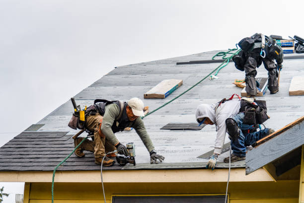 Professional Roofing technician working in Bedford, NY